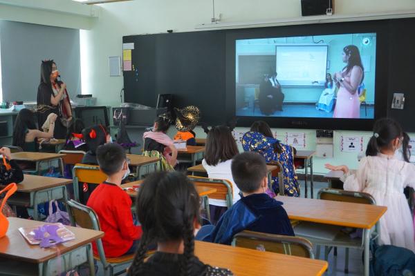 Students are paying attention to watch the Halloween live show